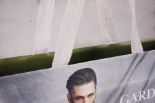 Cotton band in herringbone pattern as carrying strap for paper bags