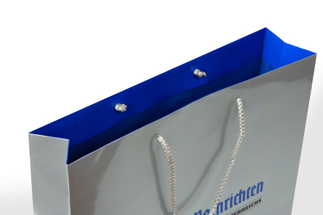 Inside the bag in blue Pantone 293C printed, protective lacquer inside pocket print, Austria